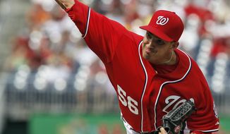 Washington Nationals relief pitcher Christian Garcia throws during a baseball game against the Miami Marlins at Nationals Park Saturday, Sept. 8, 2012, in Washington. (AP Photo/Alex Brandon)