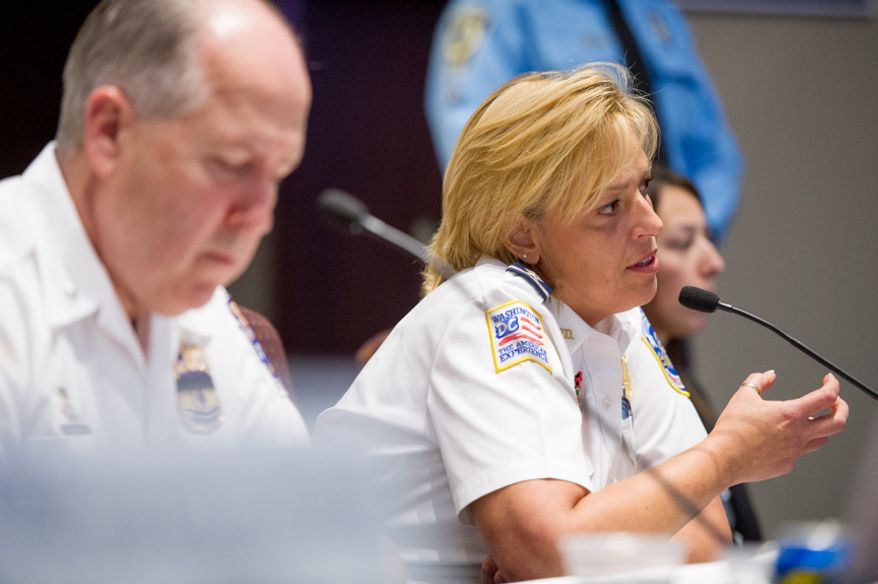 D.C. Police Chief Cathy L. Lanier and Prince George's County Police Chief Mark Magaw deliver new crime statistics for the D.C. metropolitan area to the Metropolitan Washington Council of Governments on Wednesday, Sept. 12, 2012. (Andrew Harnik/The Washington Times)
