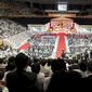 Thousands of people fill the stadium at the Cheong Shim Peace World Center in Gapyeong, Korea on Saturday, Sept. 15, 2012, for the seonghwa, or ascension, ceremony, known as the traditional funeral in western terms, for the late Rev. Sun Myung Moon. Some 15,000 people fit into the stadium, where the funeral was held, with another 10,000 to 15,000 expected to be watching live simulcasts around the complex. (Barbara L. Salisbury/The Washington Times)
