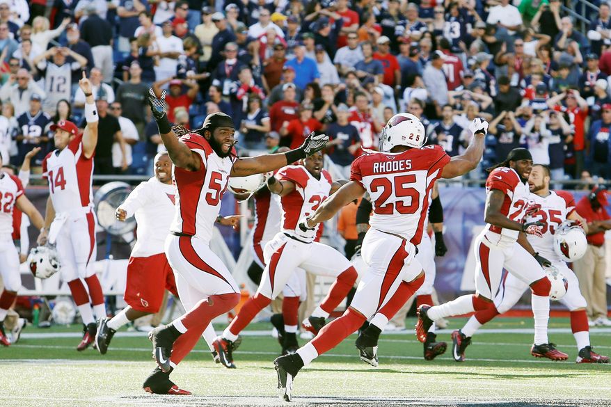 associated press
Safety Kerry Rhodes and the Cardinals improved to 2-0 on the season after Patriots kicker Stephen Gostkowski missed a 42-yard field-goal with 6 seconds left.