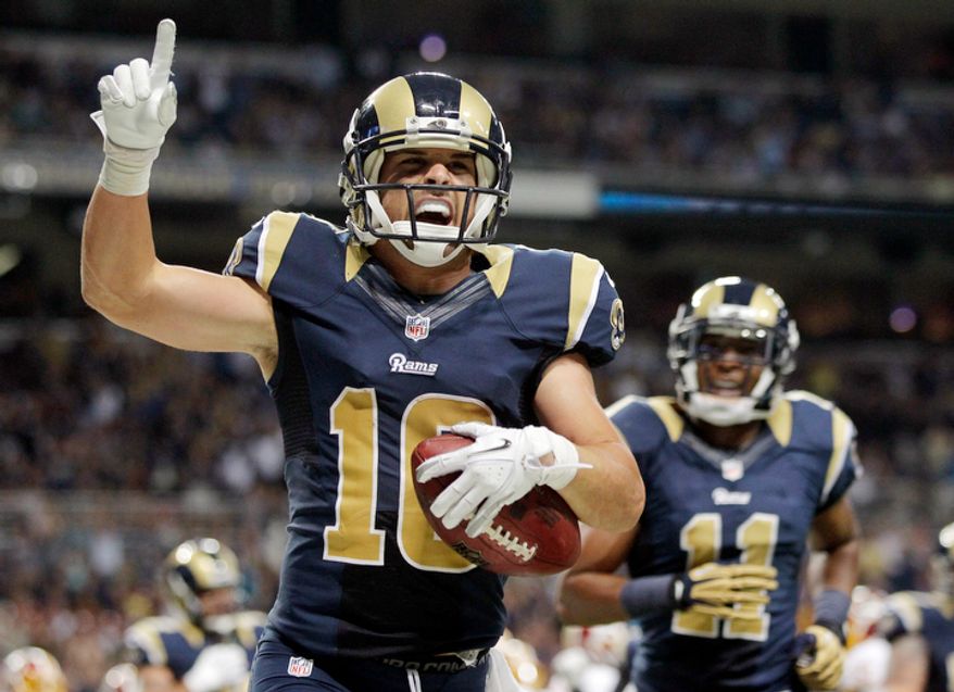 St. Louis Rams wide receiver Danny Amendola, left, celebrates after catching a 1-yard touchdown pass as teammate Brandon Gibson looks on during the second quarter. (AP Photo/Seth Perlman)