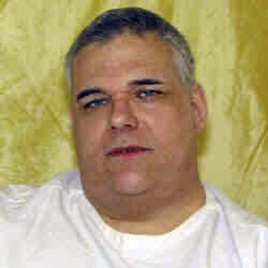 This undated photo provided by the Ohio Department of Rehabilitation and Corrections shows death row inmate Ronald Post. Post, 53, scheduled to die Jan. 16, 2013, for the 1983 shooting death of a hotel desk clerk, wants his upcoming execution delayed. At 480 pounds, Post says he’s too heavy for the state’s lethal injection process. (Associated Press/Ohio Dept. of Rehabilitation and Corrections)