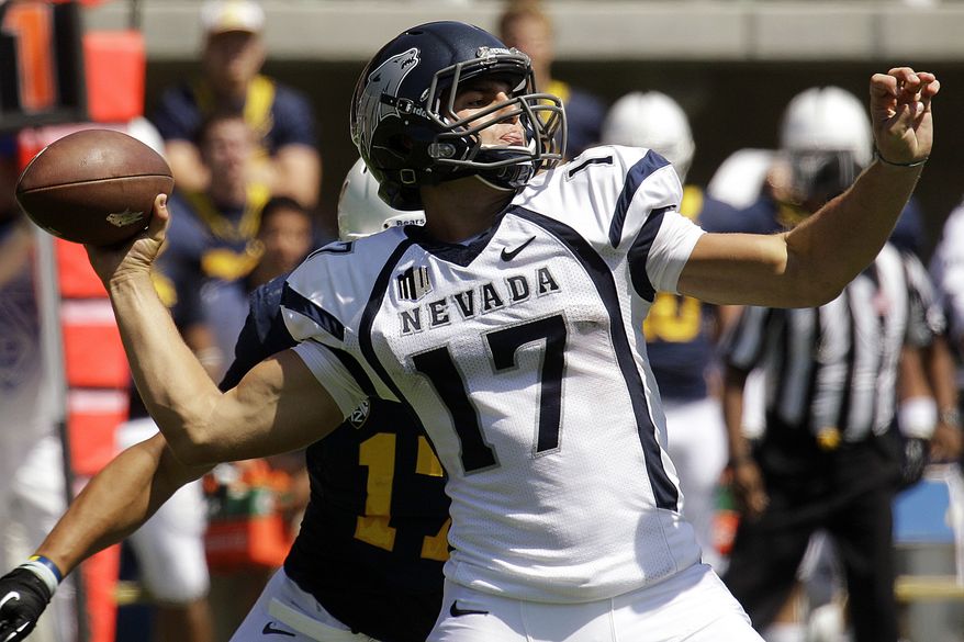 FILE - In this Sept. 1, 2012, file photo, Nevada quarterback Cody Fajardo (17) drops back to pass against California during the first half of an NCAA college football game in Berkeley, Calif. The season is now three weeks old, and the stats are proving what defensive coordinators have known for years_ a dual threat quarterback is still the most dangerous weapon an offense can have. Fajardo, Michigan's Denard Robinson and Ohio State's Braxton Miller are the only quarterbacks in the nation with at least 1,000 yards passing and 300 yards rushing this season. (AP Photo/Ben Margot, File)