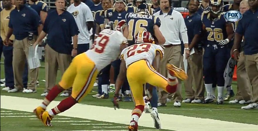 London Fletcher hit Rams WR Danny Amendola in bounds but was penalized for hitting him out of bounds. / FOX Sports, NFL.com
