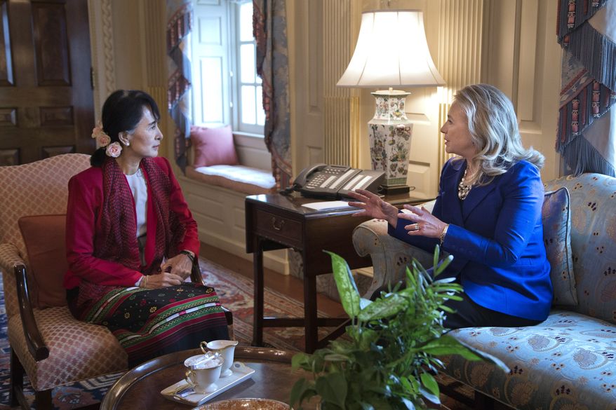Secretary of State Hillary Rodham Clinton (right) meets with Myanmar democracy leader Aung San Suu Kyi at the State Department in Washington on Tuesday, Sept. 18, 2012. (AP Photo/ Evan Vucci)