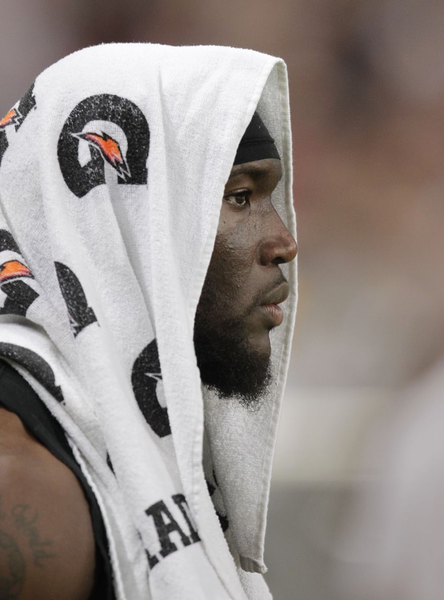 Washington Redskins outside linebacker Brian Orakpo (98) looks on during the fourth quarter of an NFL football game against the St. Louis Rams Sunday, Sept. 16, 2012, in St. Louis. The Rams won 31-28. (AP Photo/Tom Gannam)