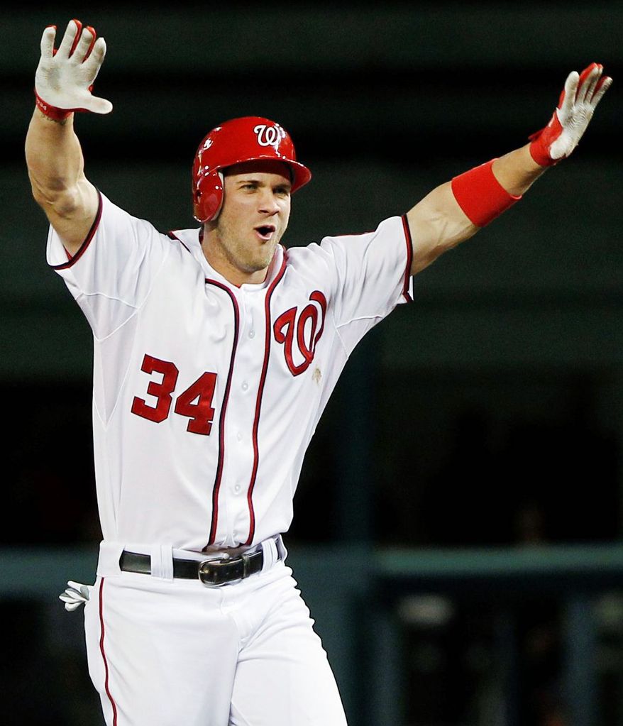 One reason the Nationals have improved by at least 10 games each year from 2010 through this season is that they have solidified positions in their lineup that once were question marks. Rookie Bryce Harper has done his share in the outfield since being called up April 28. (Associated Press)