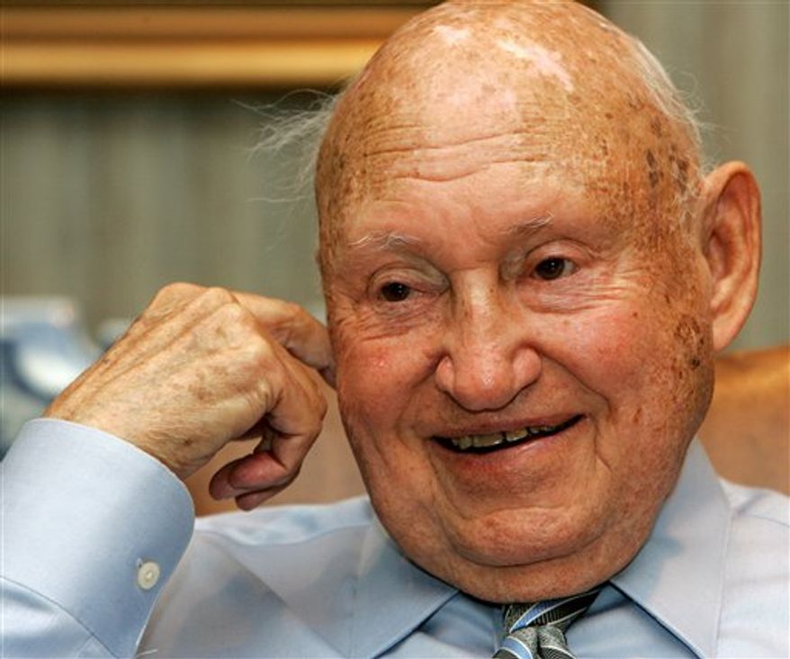** FILE ** In this July 26, 2006 photo, Chick-Fil-A founder Truett Cathy chuckles during an interview at his corporate headquarters office in Hapeville, Ga. (AP Photo/Ric Feld, File)