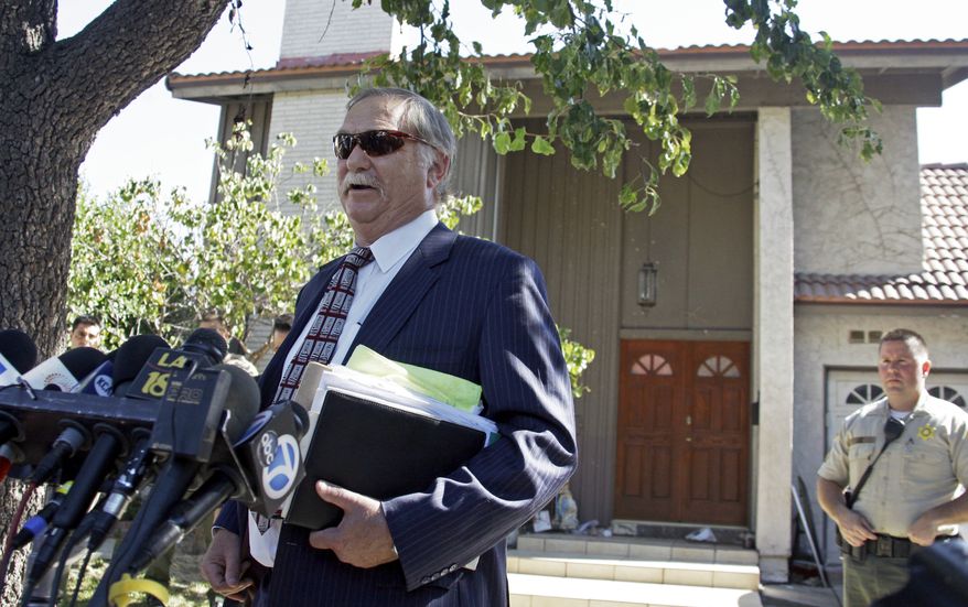 Lawyer Steve Seiden speaks to reporters outside a home believed to belong to the filmmaker associated with a crudely crafted anti-Muslim film that has caused controversy and violence throughout the Middle East and elsewhere, in the Los Angeles suburb of Cerritos, Calif., on Friday, Sept. 14, 2012. (AP Photo/Reed Saxon)