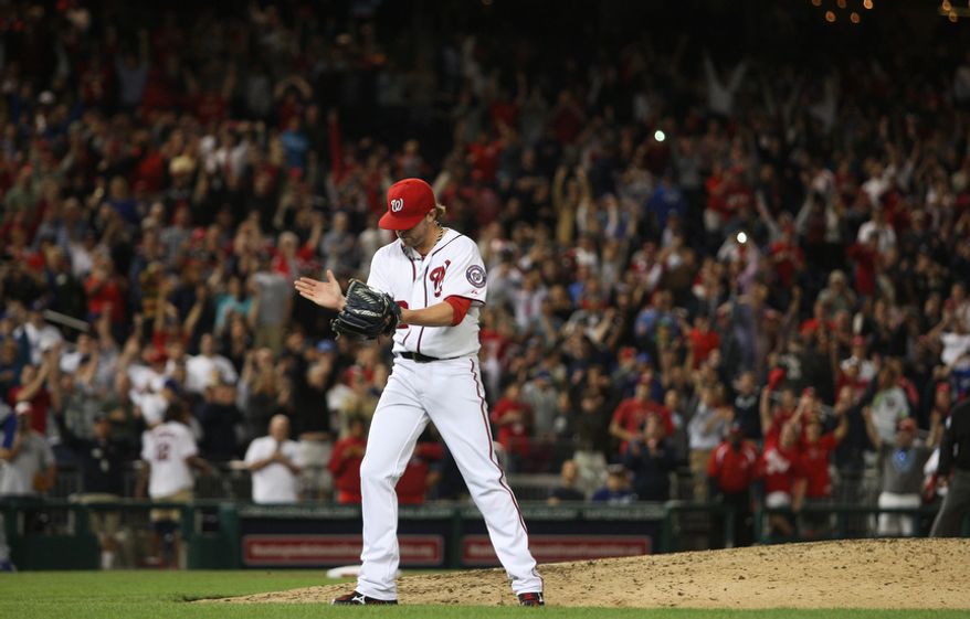 Washington Nationals Washington Nationals relief pitcher Drew Storen (22) celebrate after throwing the final strike out to beating the Los Angeles Dodgers 4-1at Nationals Park, Thursday, Sept. 20, 2012, in Washington, DC. The Washington Nationals clinched a spot in the playoff for the first time in team history. (Craig Bisacre/The Washington Times)