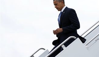 ** FILE ** President Barack Obama arrives on Air Force One at John F. Kennedy International Airport, Tuesday, Sept. 18, 2012, in New York. (AP Photo/Carolyn Kaster)