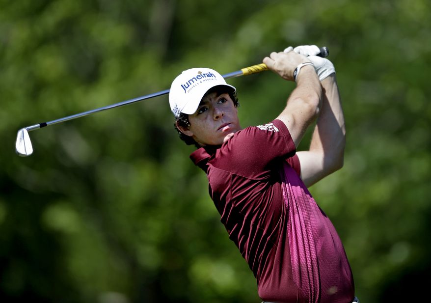 Rory McIlroy, of Northern Ireland, hits during a practice round at the Tour Championship golf tournament, Wednesday, Sept. 19, 2012, in Atlanta. The tournament begins Thursday. (AP Photo/David Goldman)