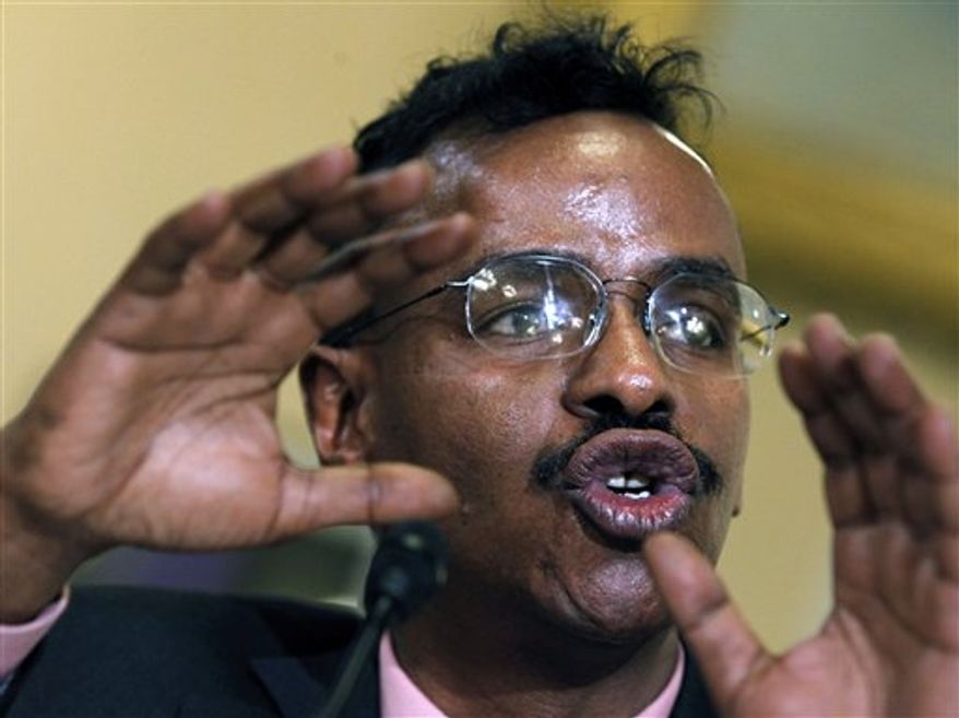 ** FILE ** In this March 10, 2011, file photo, Abdirizak Bihi, director of the Somali Education and Social Advocacy Center, testifies during a hearing of the House Homeland Security Committee, on "the extent of the radicalization" of American Muslims, on Capitol Hill in Washington. Bihi, a spokesman for the family of 21-year-old Omar Farah, said Farah traveled to Somalia to join al-Shabab. (AP Photo/Alex Brandon, File)