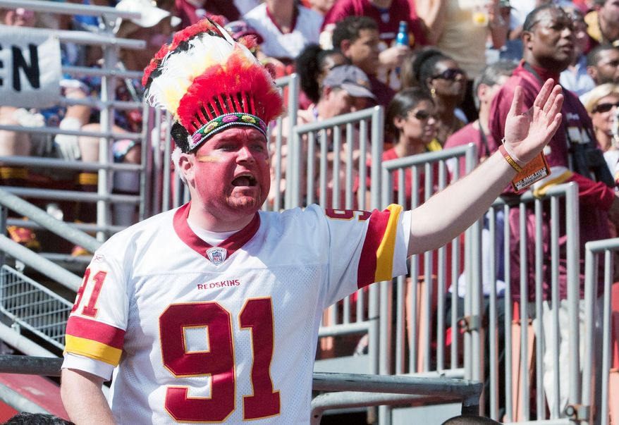 Fans react to ruling on the field during the first half of the the Washington Redskins against the Cincinnati Bengals, Landover, Md., Sunday, September 23, 2012. (Craig Bisacre/The Washington Times)
