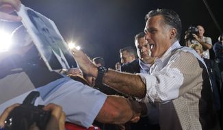 Republican presidential candidate Mitt Romney campaigns at D’Evelyn High School in Denver on Sunday, Sept. 23, 2012. (AP Photo/Charles Dharapak)