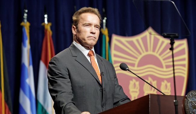 Movie star and former California Gov. Arnold Schwarzenegger delivers the keynote address Monday at a symposium launching the Schwarzenegger Institute for State and Global Policy at the University of Southern California in Los Angeles. (Associated Press)