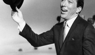 **FILE** Andy Williams performs a song on a television show on May 12, 1961. (Associated Press)