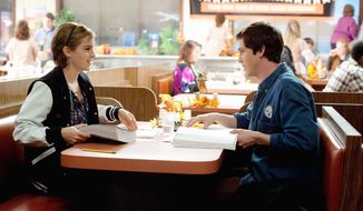 Emma Watson and Logan Lerman star in “The Perks of Being a Wallflower,” writer-director Stephen Chbosky’s adaptation of his own novel exploring the trials of adolescence. (Summit Entertainment via Associated Press)
