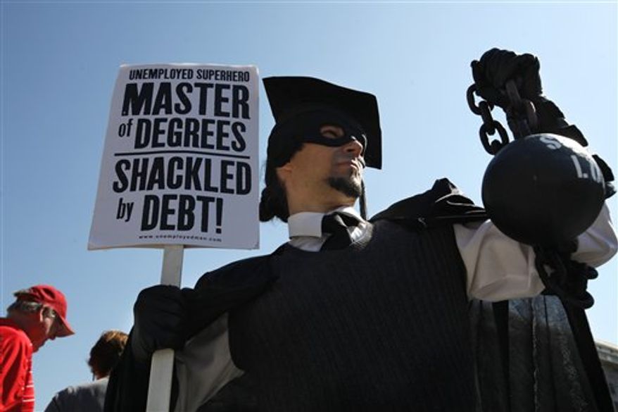 Financially ill-prepared college students "take on mountains of student debt without any hope of paying it off," says Jordan Goodman. Shown: scene from a 2011 protest in Washington, D.C.. (AP Photo/Jacquelyn Martin)