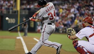 Washington Nationals&#39; Bryce Harper hits a home run off Philadelphia Phillies starting pitcher Tyler Cloyd in the first inning of a baseball game, Thursday, Sept. 27, 2012, in Philadelphia. The Nationals won the game, 7-3. (Associated Press)