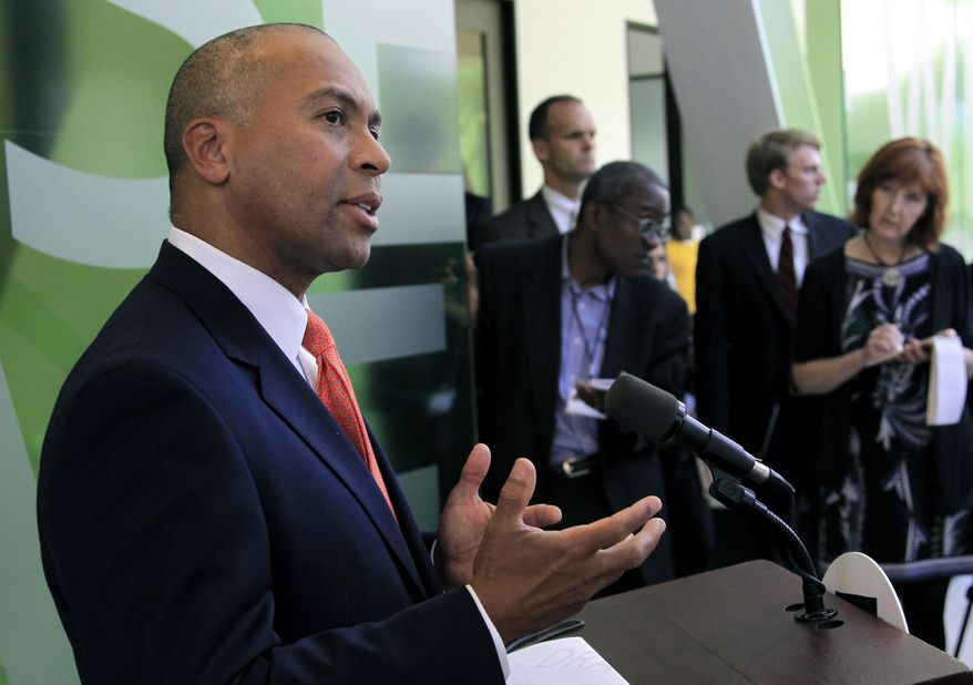 Massachusetts Gov. Deval Patrick speaks with reporters in Cambridge, Mass., on Thursday, Sept. 27, 2012. Mr. Patrick said he expects criminal charges will be brought in an investigation of misconduct by a state lab chemist who admitted faking drug-sample results, forging signatures and skipping proper procedures. (AP Photo/Steven Senne)
