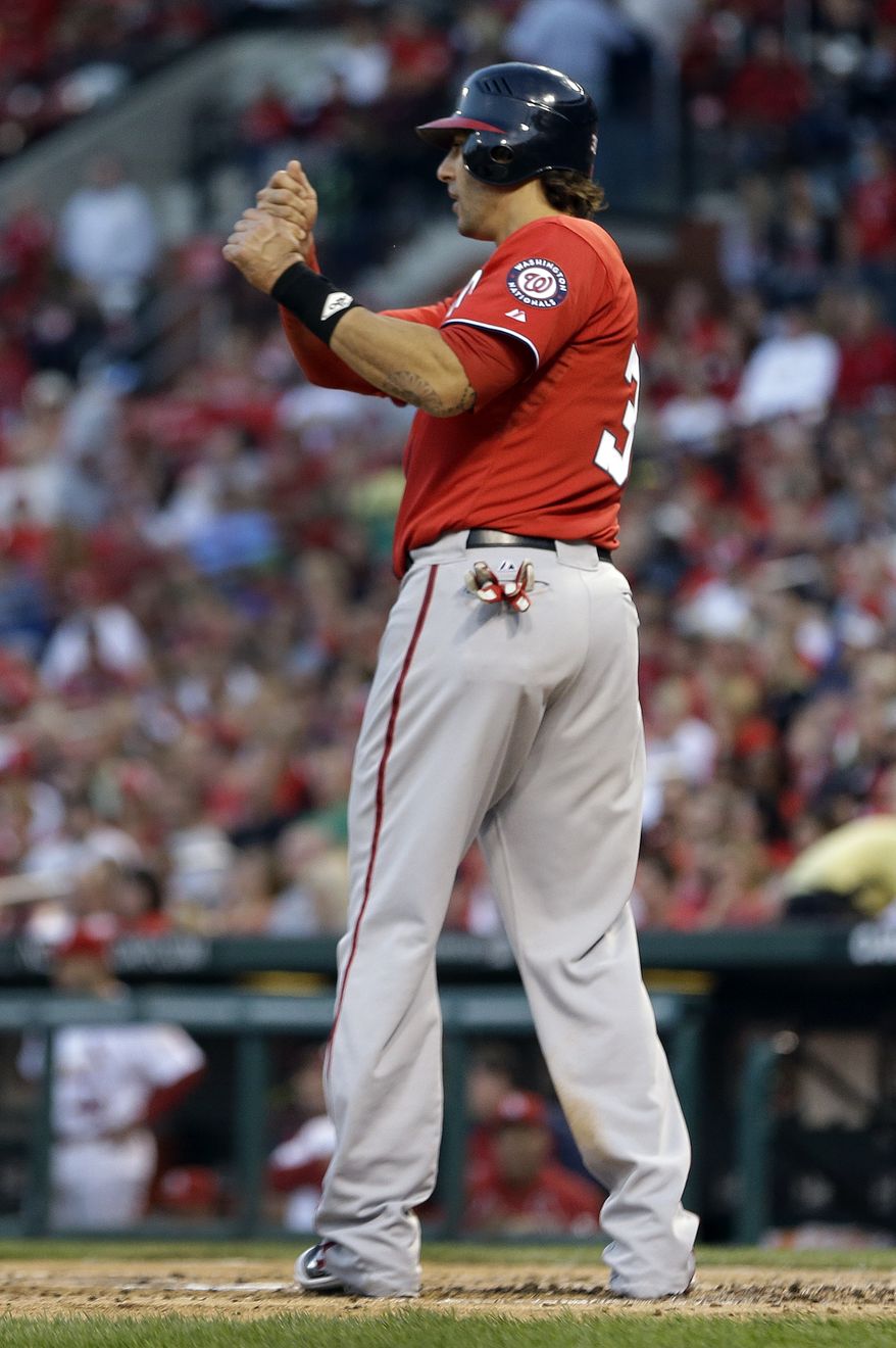 Michael Morse pantomimes a swing to get his grand slam going for the second time Saturday night. (Associated Press)