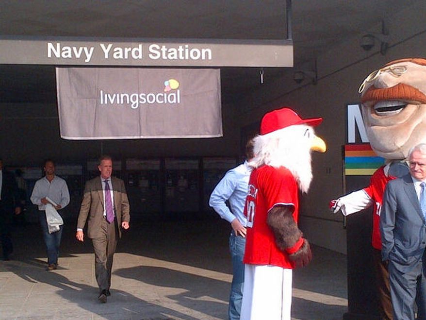 D.C. officials, Nats mascots and LivingSocial leadership unveiled LivingSocial's deal to pay for extra hours of post-season Metro service at a press conference at the Navy Yard Metro station last week. (Tom Howell Jr./The Washington Times)