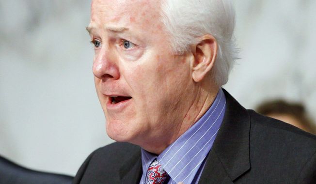 Sen. John Cornyn, Texas Republican, wants the Justice Department to release information on gunrunning operations in Texas and the source of guns in the 2011 killing of a U.S. agent. (Associated Press)