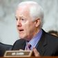 Sen. John Cornyn, Texas Republican, wants the Justice Department to release information on gunrunning operations in Texas and the source of guns in the 2011 killing of a U.S. agent. (Associated Press)