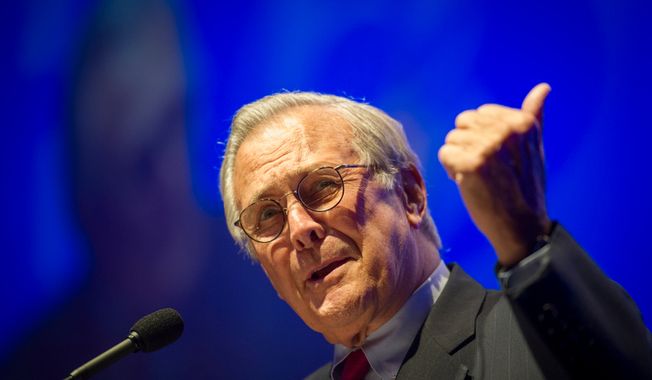 **FILE** Former Secretary of Defense Donald Rumsfeld delivers his speech to the crowd during a &quot;Symposium on Values and Consequences&quot; as part of the 30th anniversary celebration of The Washington Times at the Marriott Wardman Park Hotel in Washington on Oct. 2, 2012. (The Washington Times)