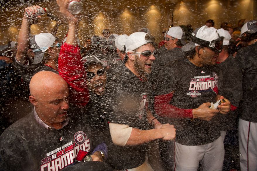 The Washington Nationals celebrate getting into the playoffs in their locker room at Nationals Park, Washington, D.C., Monday, October 1, 2012. (Andrew Harnik/The Washington Times)