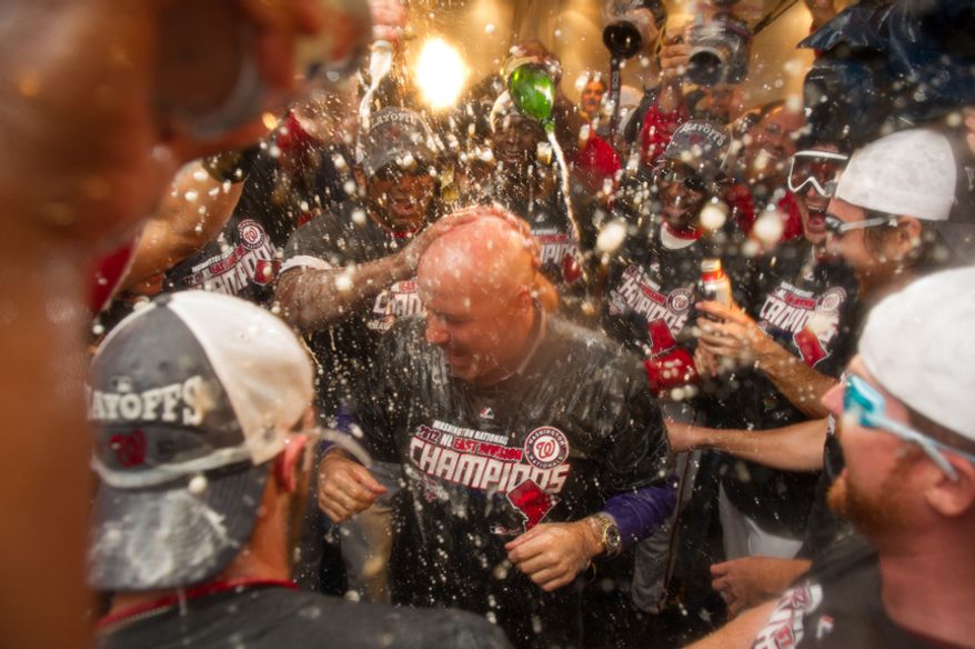 The Washington Nationals celebrate getting into the playoffs in their locker room at Nationals Park, Washington, D.C., Monday, October 1, 2012. (Andrew Harnik/The Washington Times)