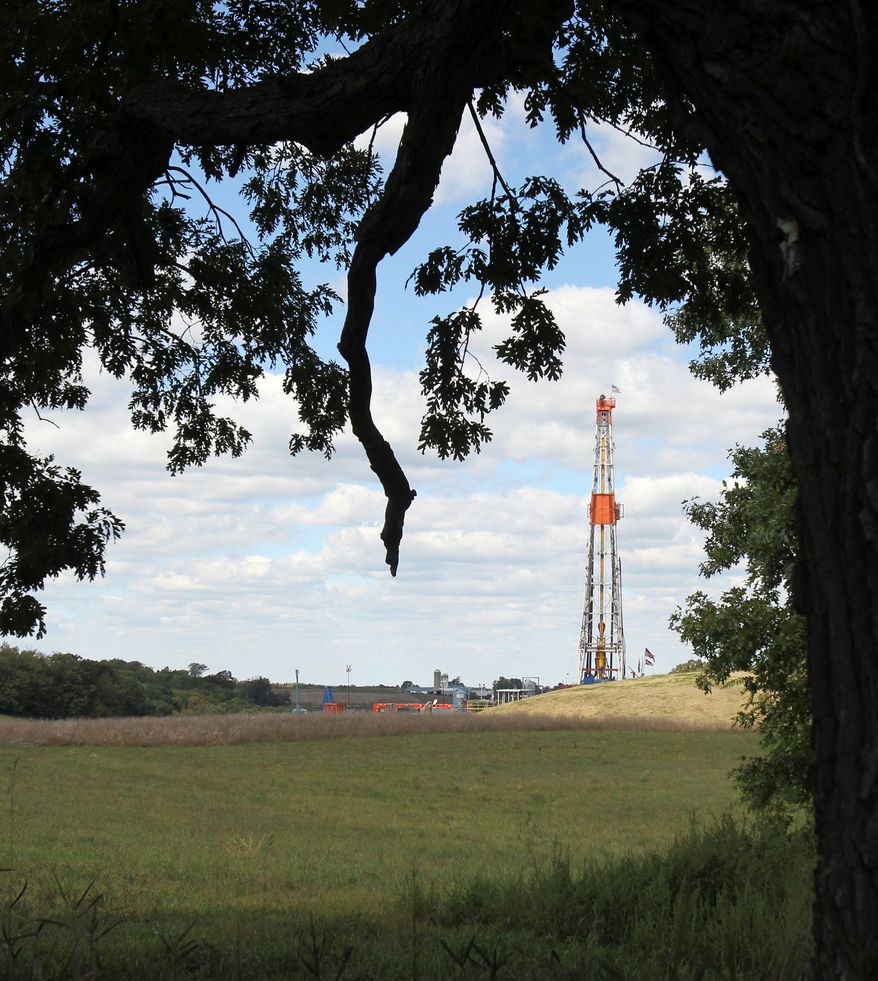 A drill rig helps bring much-needed jobs to Carrollton, Ohio. Carroll County boasts more active oil and gas wells than any other county in Ohio, and the tax dollars are flowing right along with the crude. (Associated Press)