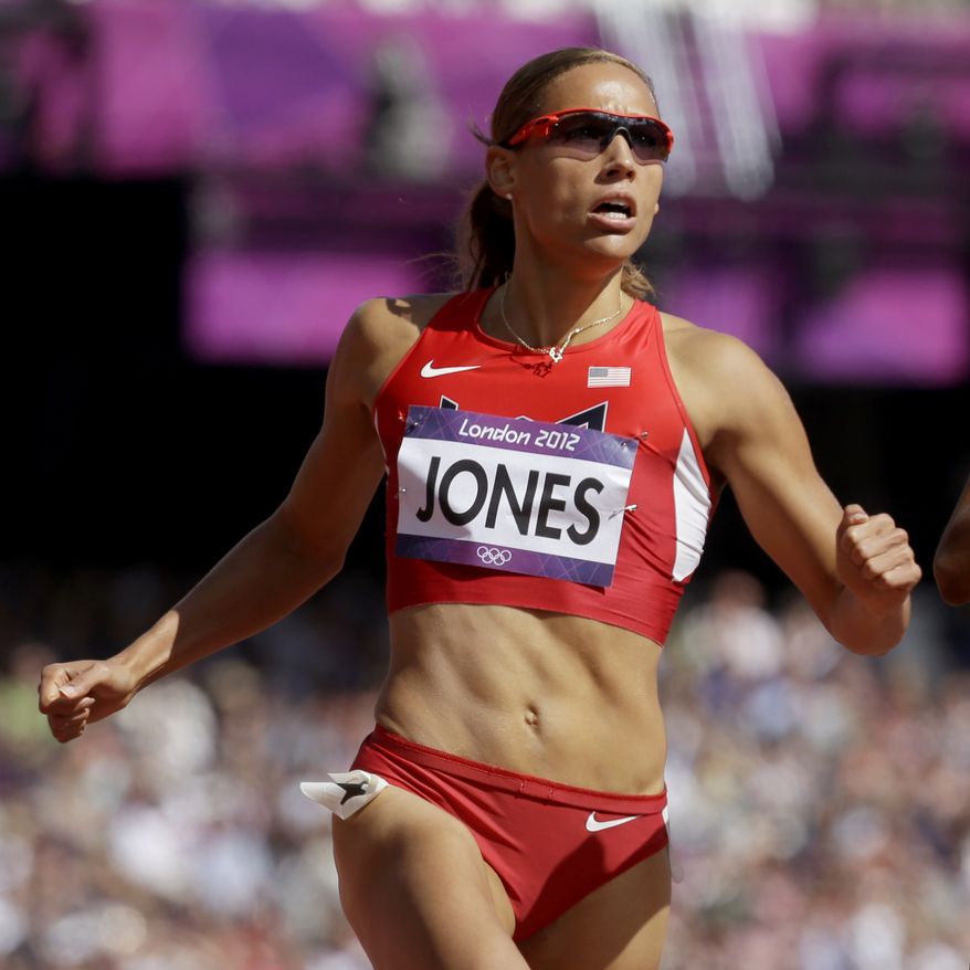 FILE - This Aug. 6, 2012 file photo shows hurdler Lolo Jones competing in a women's 100-meter hurdles heat at at the 2012 Summer Olympics in London. Jones trash-talked about head injuries to former Rutgers football player Eric LeGrand, Tuesday, Oct. 2, 2012, after he jokingly challenged her to a race on Twitter. Jones didn't know the defensive tackle was paralyzed in a game. (AP Photo/Anja Niedringhaus, File)