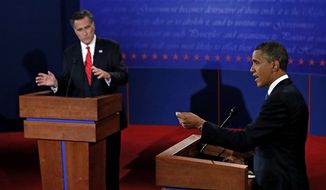President Obama and Republican presidential nominee Mitt Romney participate Oct. 3, 2012, in the first presidential debate at the University of Denver in Denver. (Associated Press)