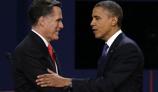 Republican presidential nominee Mitt Romney and President Barack Obama shake hands after the first presidential debate at the University of Denver, Wednesday, Oct. 3, 2012, in Denver. (AP Photo/Charlie Neibergall)
