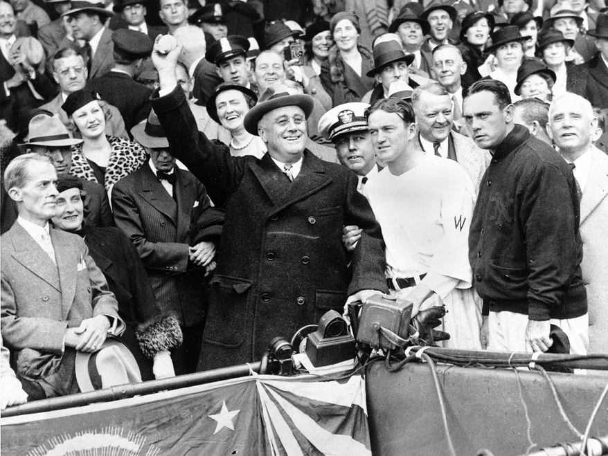 President Franklin D. Roosevelt threw out the ceremonial first pitch at Griffith Stadium before Game 3 of the 1933 World Series between Washington and the New York Giants as Senators manager Joe Cronin (third from right) and New York counterpart Bill Terry (second from right) look on. The Fall Classic was a national obsession, as evidenced by a scoreboard outside a building in Norfolk, Va., that tracked the developments of Game 1. The Giants won the World Series 4-1, and it would be 79 years before Washington would experience postseason baseball again. (Associated Press)
