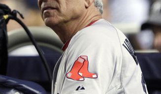 Boston Red Sox manager Bobby Valentine watches his team play the New York Yankees during the fourth inning of a baseball game, Wednesday, Oct. 3, 2012, in New York. (AP Photo/Frank Franklin II)