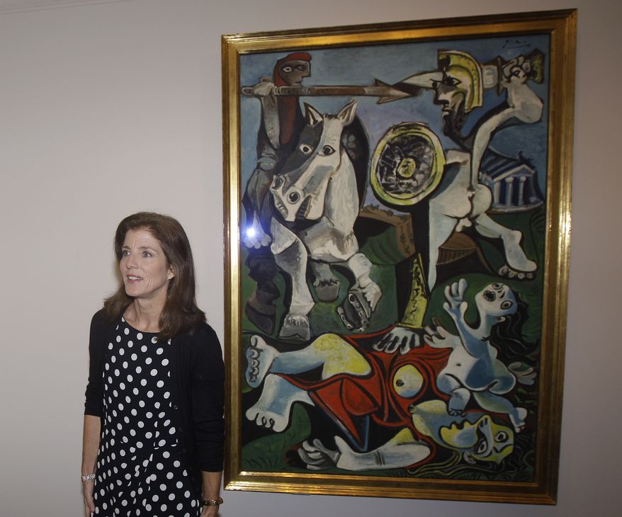 Caroline Kennedy, president of the John F. Kennedy Library Foundation, unveils Pablo Picasso's painting "Rape of the Sabine Women" at the JFK Library and Museum in Boston on Thursday, Oct. 4, 2012. The painting is on loan to the library from the Museum of Fine Arts, Boston, in commemoration of the upcoming 50th anniversary of the Cuban Missile Crisis, which was Picasso's inspiration for the work. (AP Photo/Stephan Savoia)
