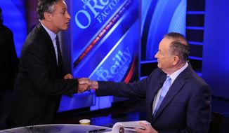 ** FILE ** Comedy Central&#39;s Jon Stewart (left) and Bill O&#39;Reilly of Fox News tape an interview in New York in September 2010. (AP Photo/Peter Kramer)