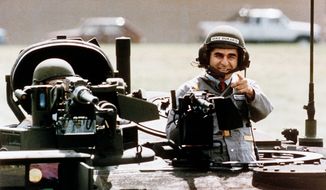 In September 1988, less than two months before Election Day, Democratic presidential candidate Michael Dukakis took a memorable ride in a new M1-A-1 battle tank. (Associated Press)
