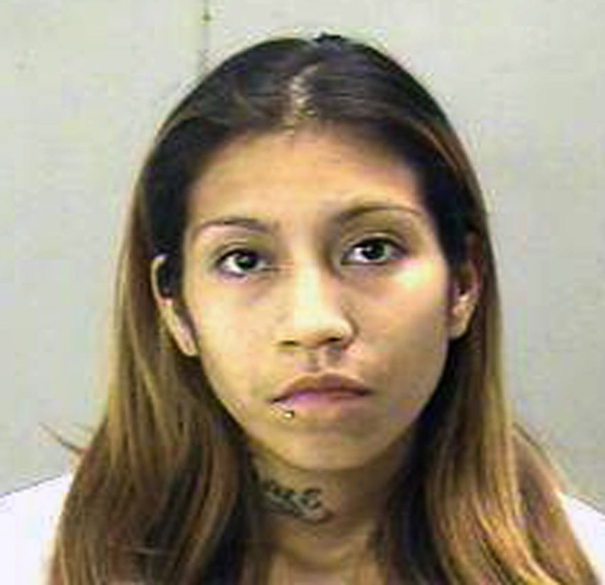 Elizabeth Escalona has admitted to beating her 2-year-old daughter and gluing her hands to a wall. (AP Photo/Dallas County, Texas, Sheriff's Department)