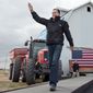 Mitt Romney, the Republican presidential nominee, arrives for a rally in Van Meter, Iowa. Mr. Romney told the crowd that “When I become president, I will do everything in my power to strengthen once again the American farm, to strengthen the family farm.” (Associated Press)