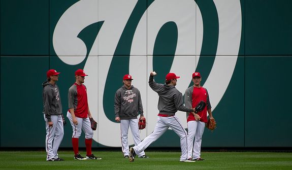The Washington Nationals work out at Nationals Park on Tuesday, Oct. 9, 2012. On Wednesday, they play the St. Louis Cardinals at home. (Barbara L. Salisbury/The Washington Times)