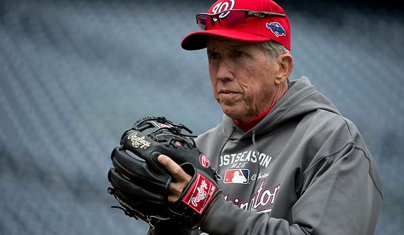 Washington Nationals manager Davey Johnson holds a glove during a workout session at Nationals Park on Tuesday, Oct. 9, 2012. On Wednesday they play the Saint Louis Cardinals at home. (Barbara L. Salisbury/The Washington Times)