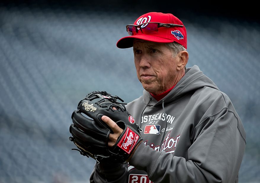 Washington Nationals manager Davey Johnson holds a glove during a workout session at Nationals Park on Tuesday, Oct. 9, 2012. On Wednesday they play the Saint Louis Cardinals at home. (Barbara L. Salisbury/The Washington Times)