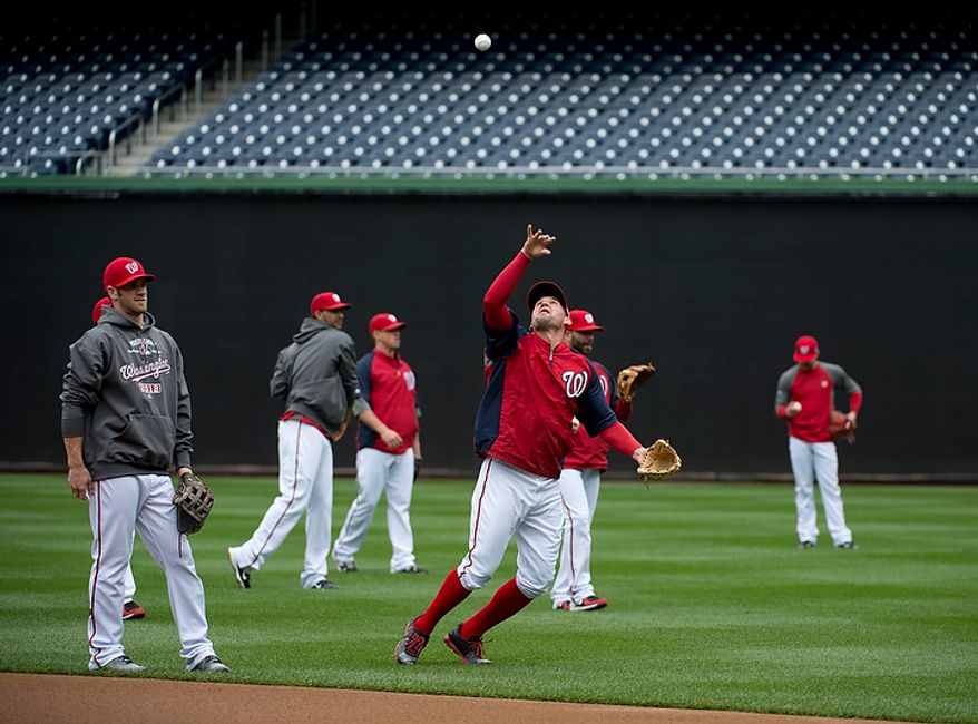 The Washington Nationals work out at Nationals Park on Tuesday, Oct. 9, 2012. On Wednesday, they play the St. Louis Cardinals at home. (Barbara L. Salisbury/The Washington Times)