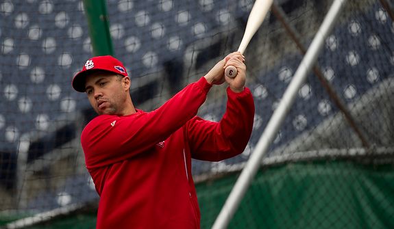 Saint Louis Cardinals player Carlos Beltran swings a bat during a workout session at Nationals Park on Tuesday, Oct. 9, 2012. On Wednesday, they play the St. Louis Cardinals at home. (Barbara L. Salisbury/The Washington Times)