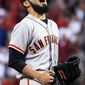 San Francisco Giants relief pitcher Sergio Romo reacts after the Giants defeated the Cincinnati Reds 2-1 in 10 innings in Game 3 of the National League division baseball series, Tuesday, Oct. 9, 2012, in Cincinnati. (AP Photo/Al Behrman)