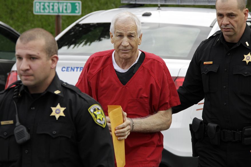 ** FILE ** Former Penn State University assistant football coach Jerry Sandusky arrives at the Centre County Courthouse in Bellefonte, Pa., on Oct. 9, 2012, for sentencing. (Associated Press)